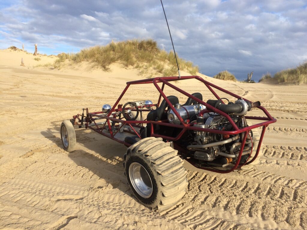red sand rail in dunes